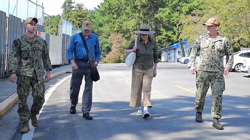 U.S. Navy veteran Dr. Daniel Frenning (middle left) and his wife Carol (middle right) tour Commander Fleet Activities Chinhae (CFAC) alongside active Sailors stationed at CFAC on September 24, 2026, Chinhae South Korea.