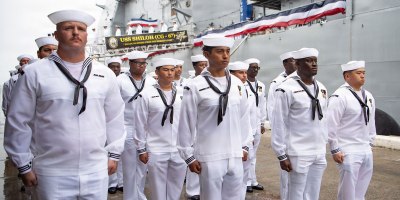 The crew of the Ticonderoga-class guided-missile cruiser USS Shiloh (CG 67) disembarks the ship for the final time upon its decommissioning during a ceremony onboard Joint Base Pearl Harbor-Hickam, Hawaii, Sept. 30, 2026.