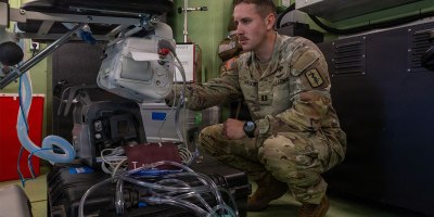 U.S. Army Capt. Josh Hagen, a critical care nurse assigned to the 67th Forward Resuscitative and Surgical Detachment, 519th Hospital Center, 30th Medical Brigade, prepares medical equipment inside an M1087 Expando Van at Rhine Ordnance Barracks, Germany, Oct. 5, 2026.